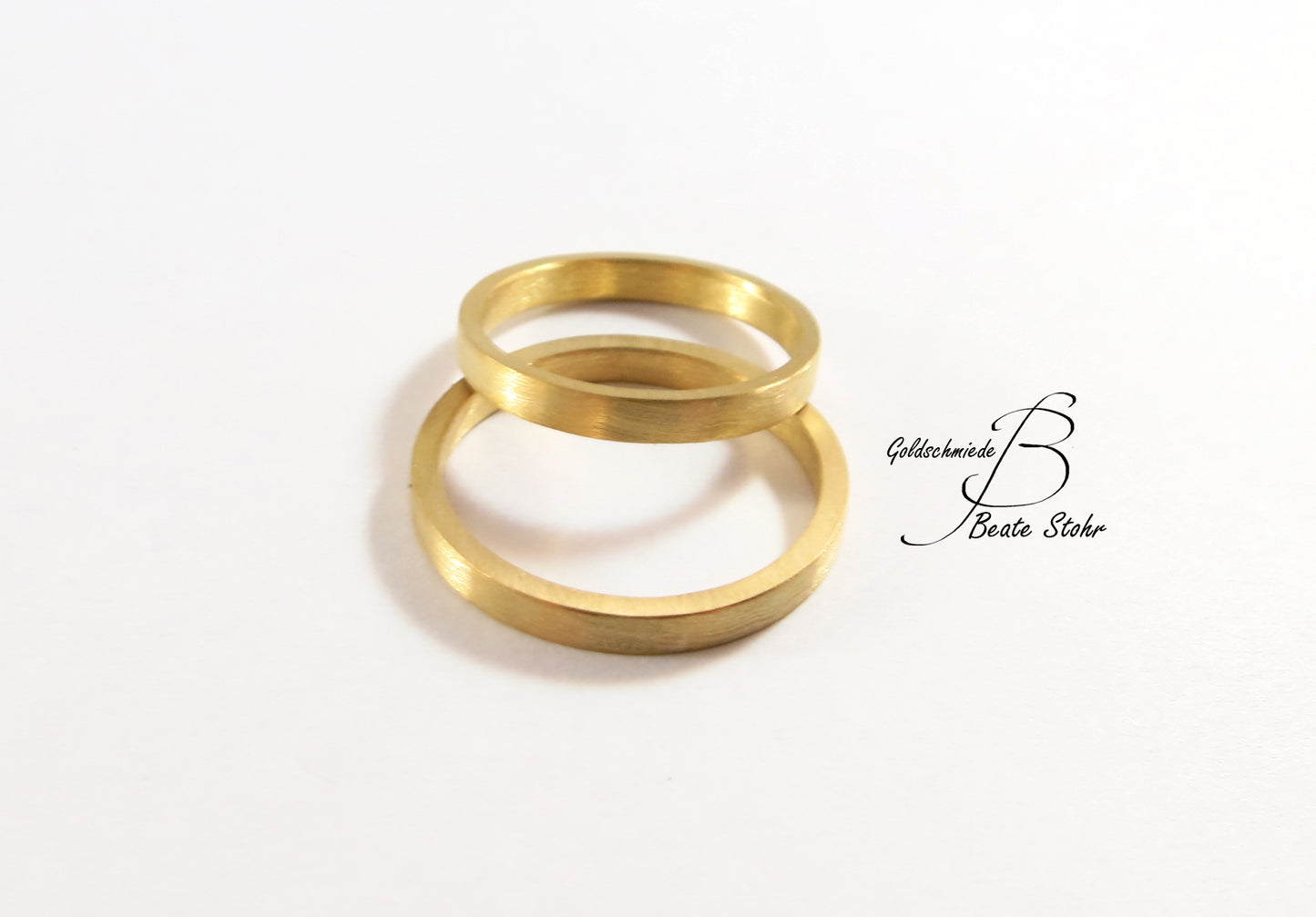 schlichte Trauringe in 585/- Gelbgold Handarbeit