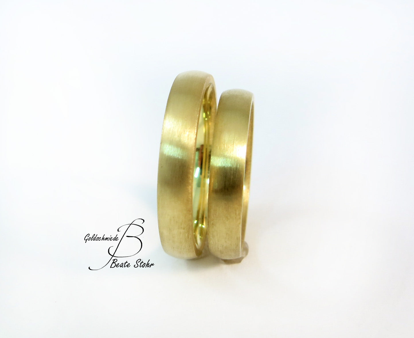 Paar Trauringe halbrund Gold 585/-