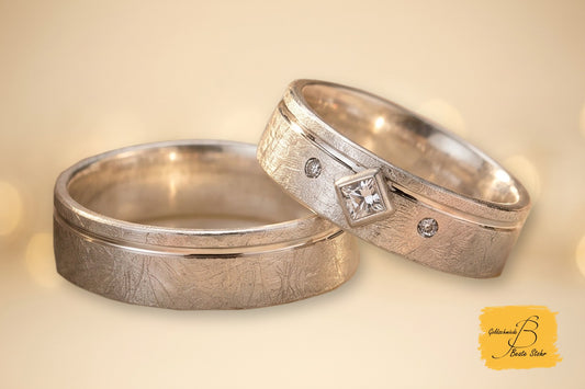 Trauringe mit Prinzess-Stein und feiner Linie: Eleganz