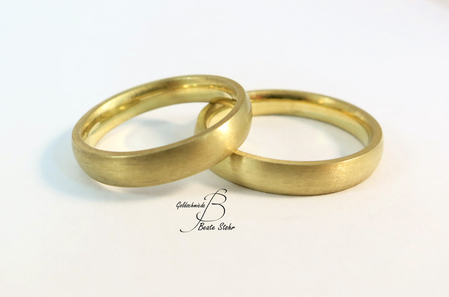 Paar Trauringe halbrund Gold 585/-