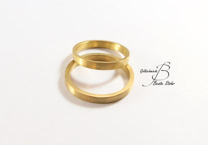 schlichte Trauringe in 585/- Gelbgold Handarbeit