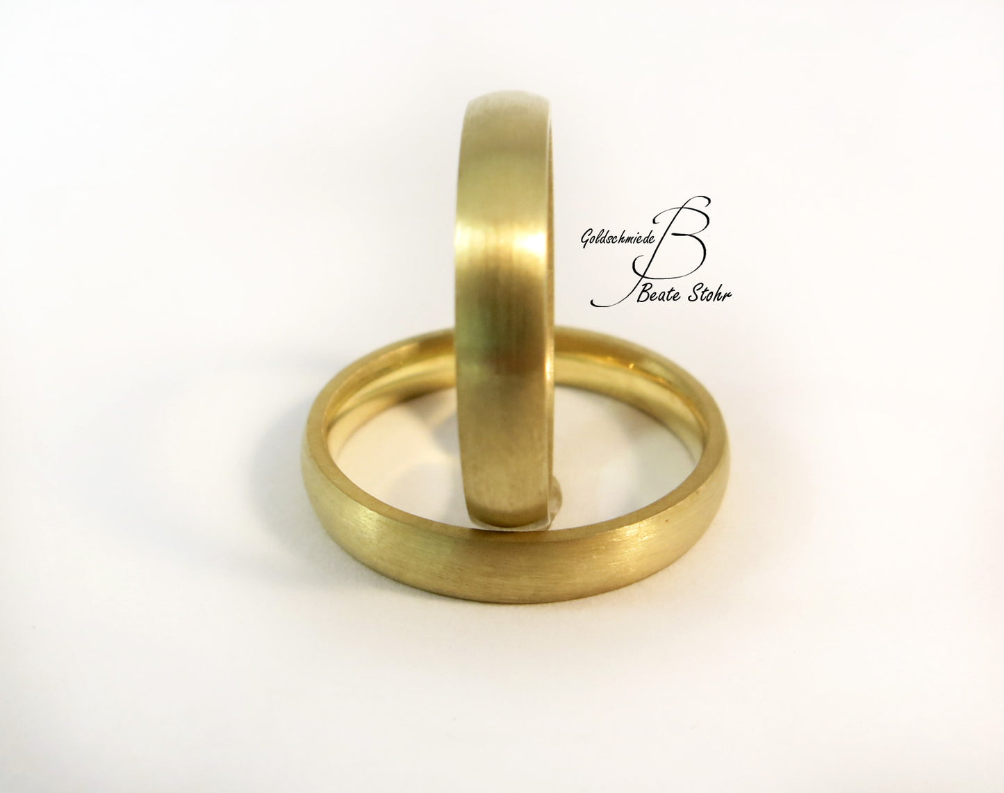 Paar Trauringe halbrund Gold 585/-