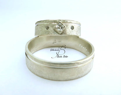 Trauringe mit Prinzess-Stein und feiner Linie